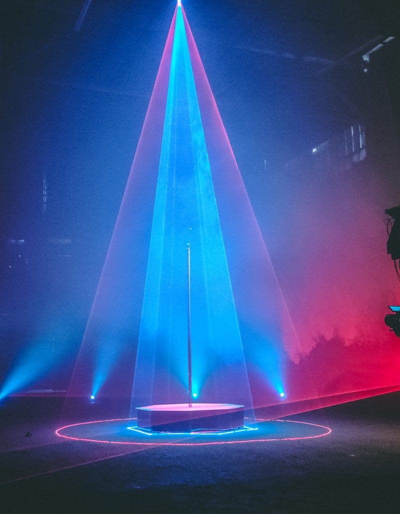 laser production lights over all star stages portable stripper pole stage on set like a christmas tree 1000px