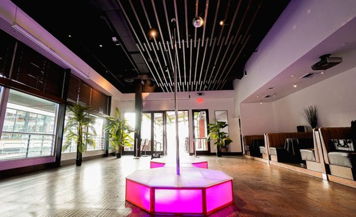 twin stripper pole stage setup and ceiling free poles in restaurant setting at santa monica promenade 1000px