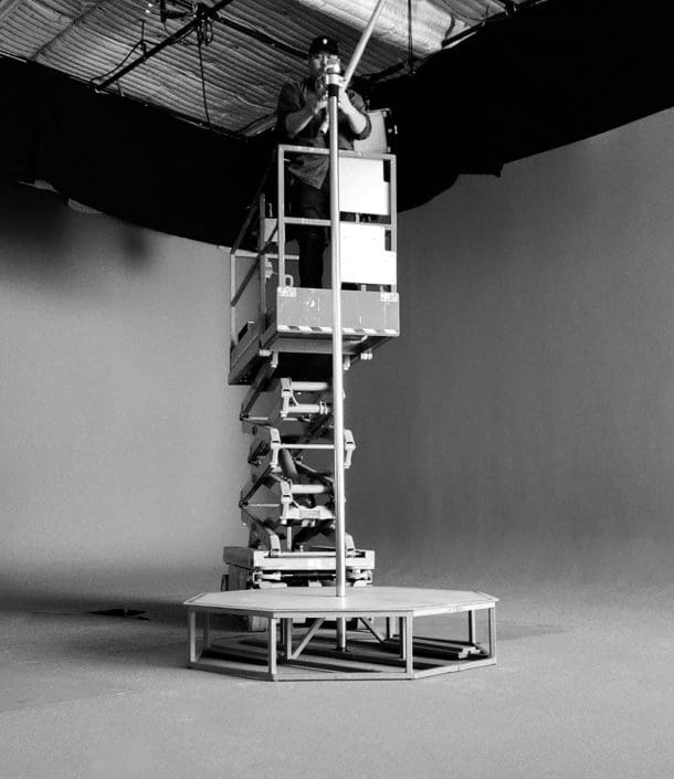 all star stages portable dance pole rigged on sound stage to lighting grid bw
