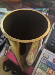 a cut of a brass pole dance pole